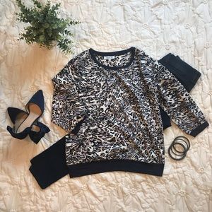 Jennifer Lopez Chic Animal Print Blouse